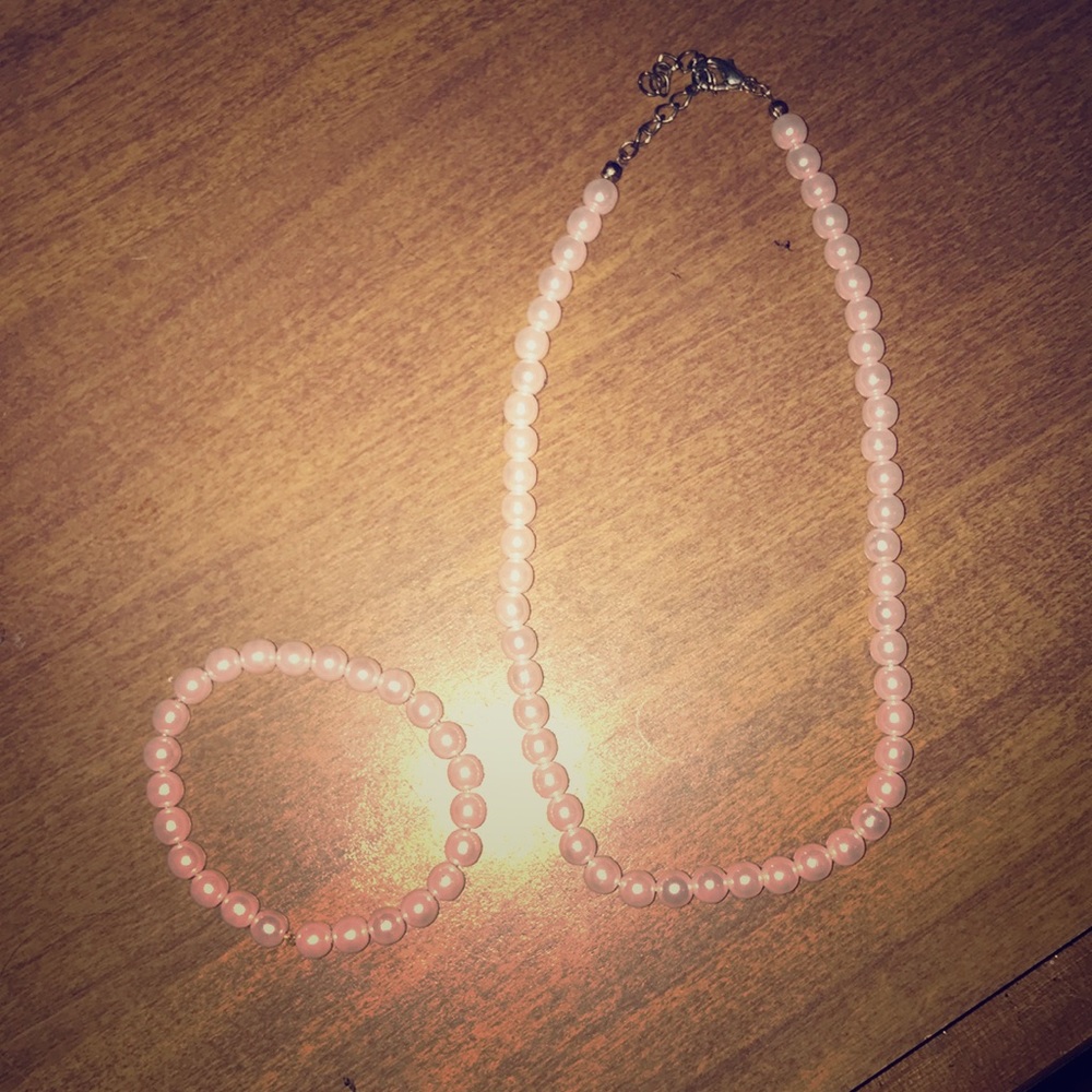 A pearl necklace and bracelet